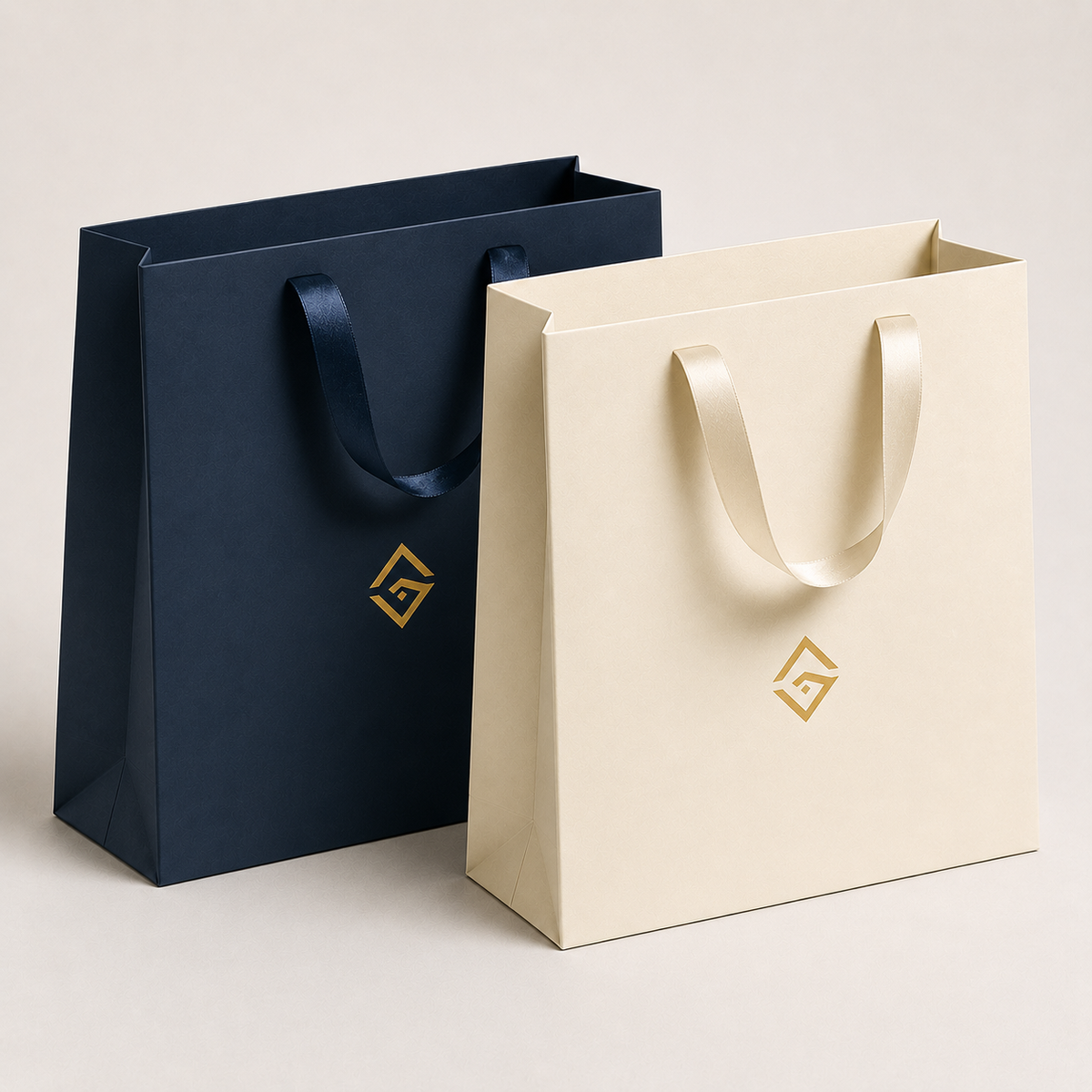 Navy and cream boutique paper bags with foil logos โ custom retail bags UAE