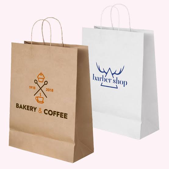 Printed kraft and white paper bags with logos โ custom paper bags UAE