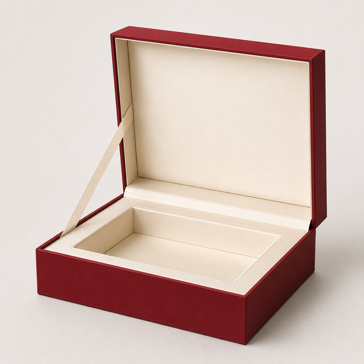Red rigid gift box with cream satin lining — luxury UAE packaging