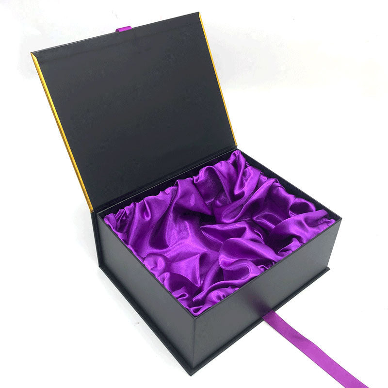 Rigid magnetic box with purple satin insert — cosmetics packaging UAE