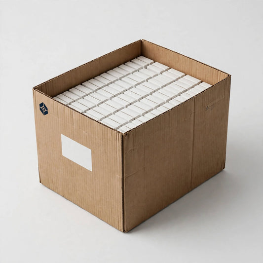 Large brown corrugated master carton open showing rows of white retail cartons packed inside — custom master cartons Dubai
