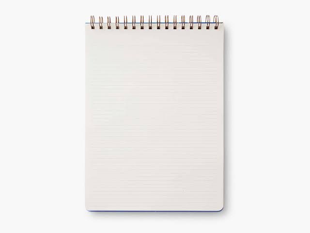 Spiral-bound lined notepad on a desk — custom notepad printing Dubai