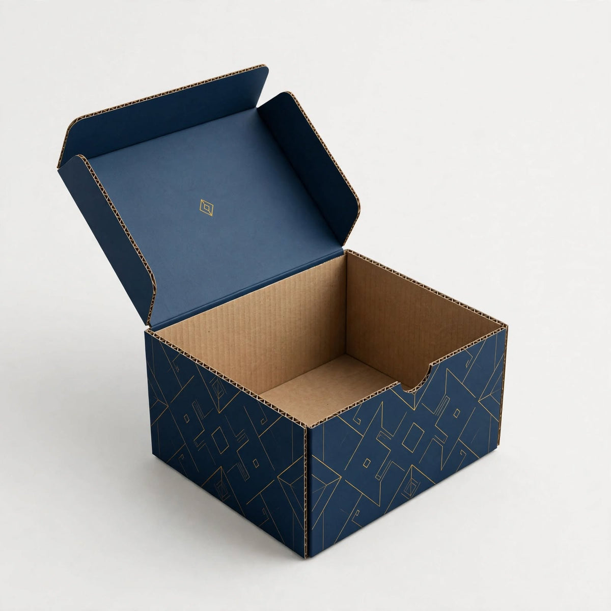 Navy full-colour printed mailer box open with gold pattern and printed inside lid — custom e-commerce packaging Dubai