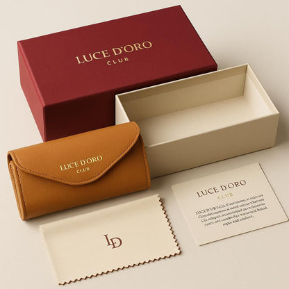 Maroon and cream sleeve box with gold foil and fitted tray for eyewear
