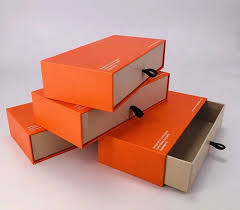 Custom orange sleeve and tray rigid boxes with slide-out drawer — ALEF UAE
