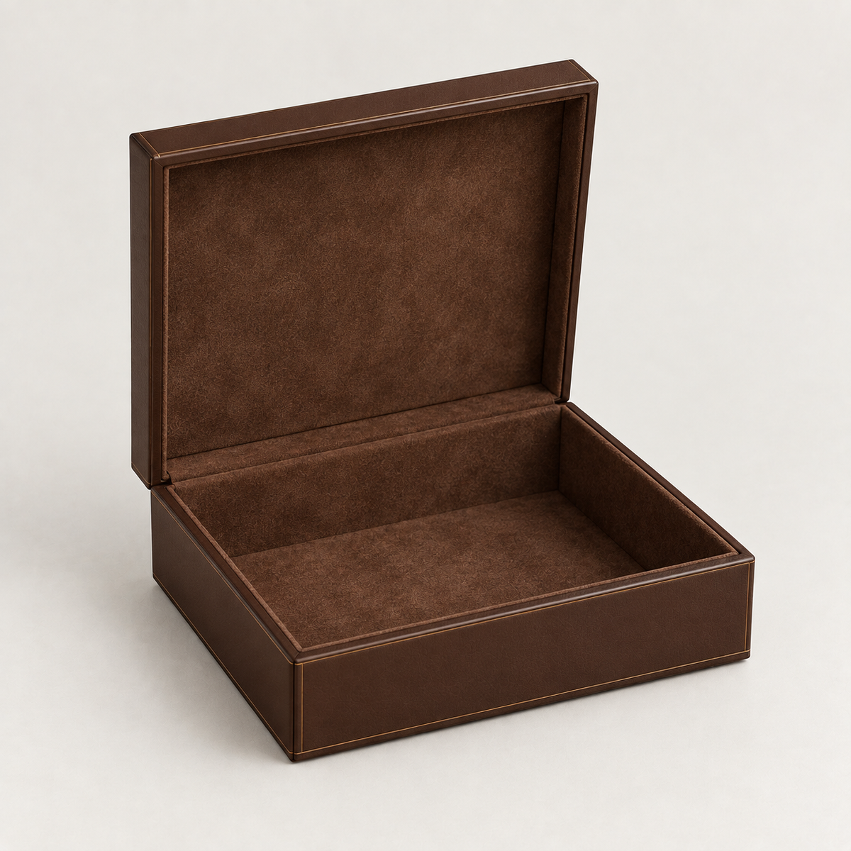 Chocolate-brown leather box open showing suede-lined interior — custom suede-lined leather boxes Dubai