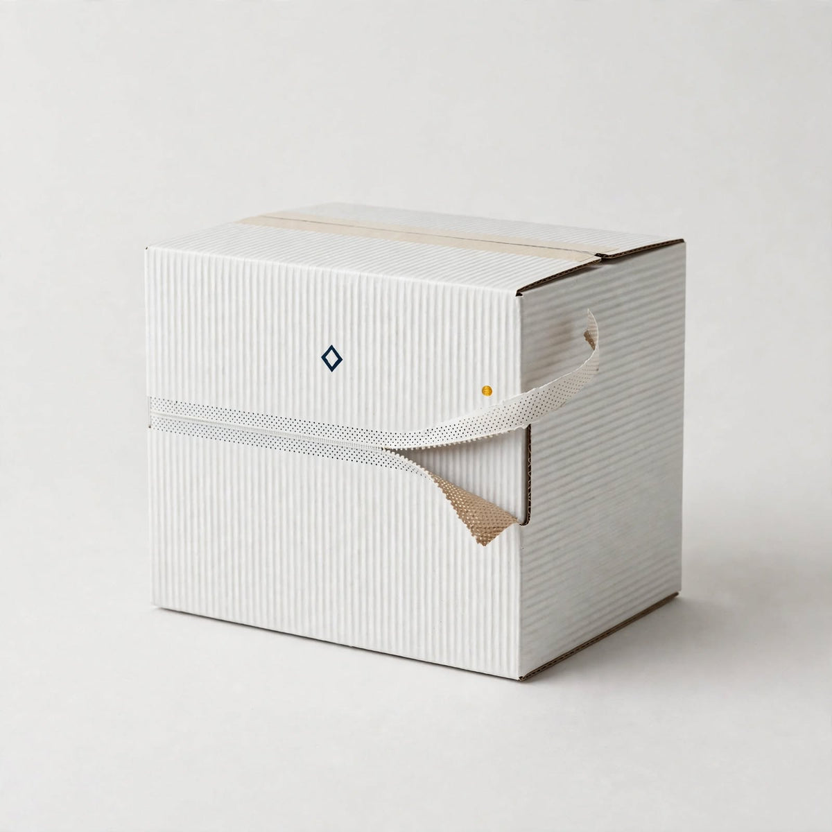 White corrugated tear-strip mailer box with zipper opening partly pulled — custom self-seal shipping box Dubai