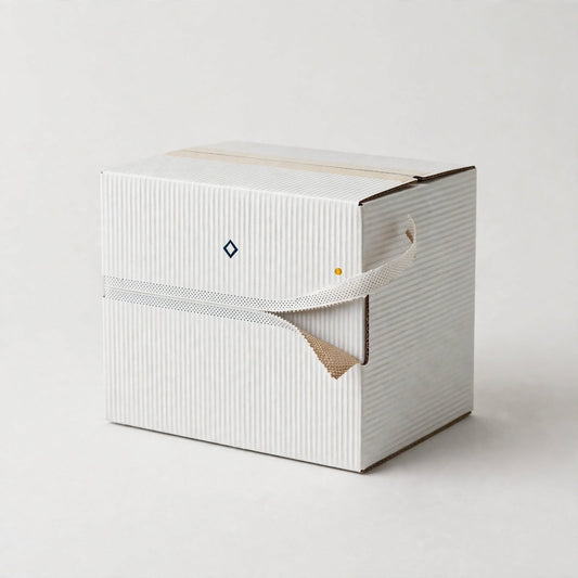 White corrugated tear-strip mailer box with zipper opening partly pulled — custom self-seal shipping box Dubai