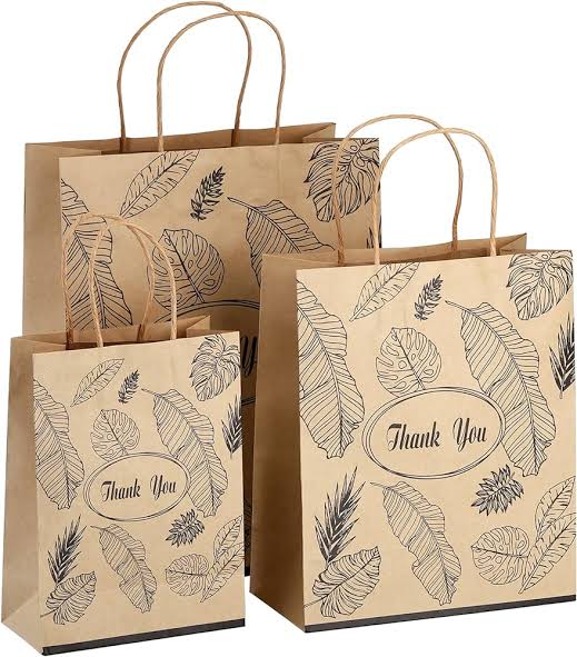 Kraft paper bags printed with a thank-you message and leaf pattern — custom kraft bags Dubai