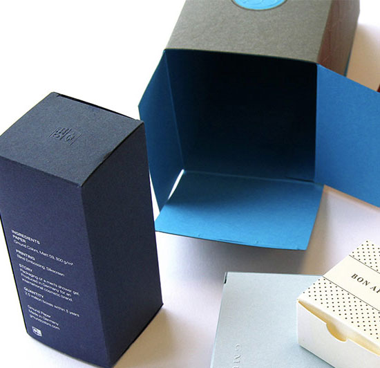 Navy two-piece rigid box structure with lid and base — custom packaging UAE